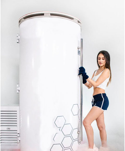 Girl standing near cryotherapy machine